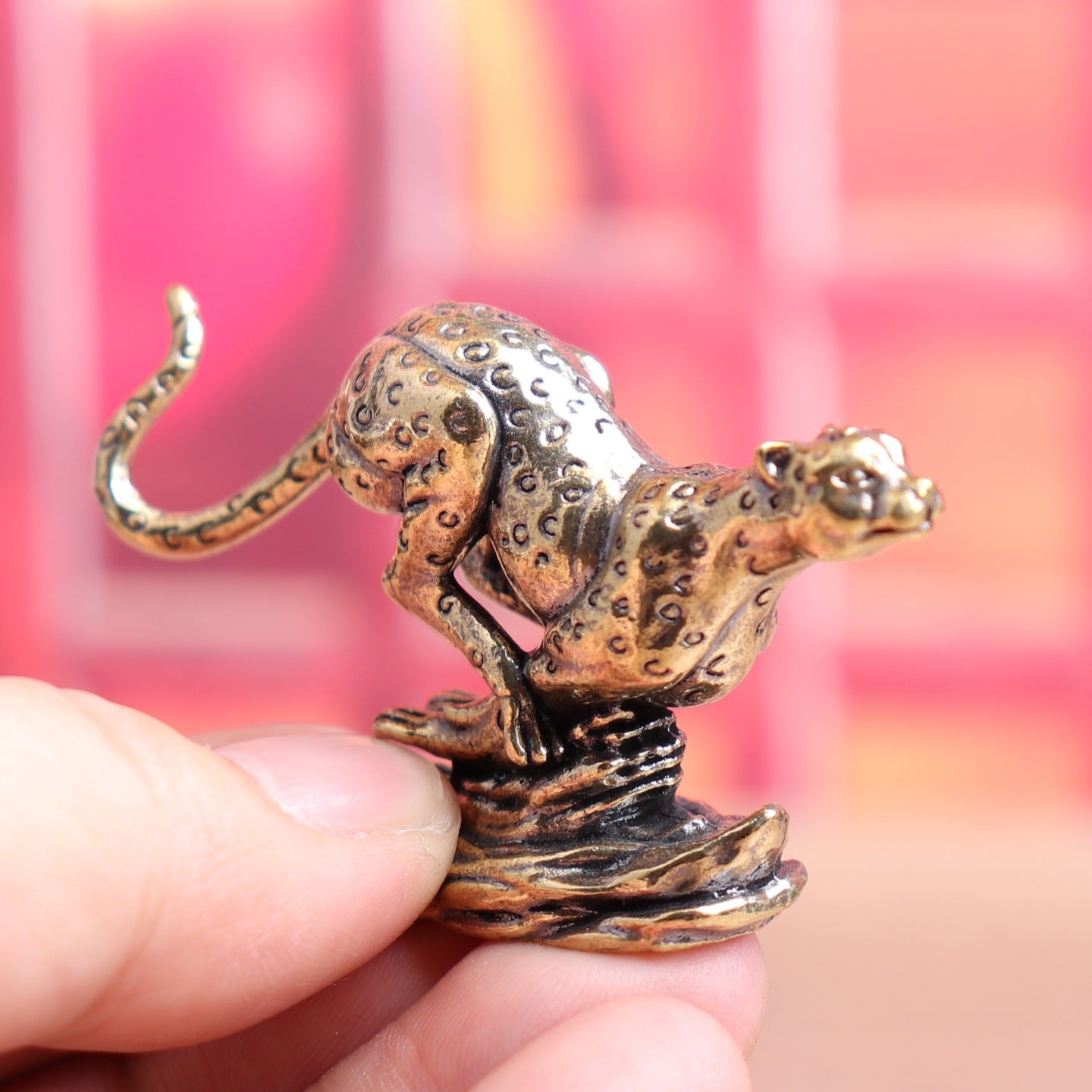 Brass running leopard