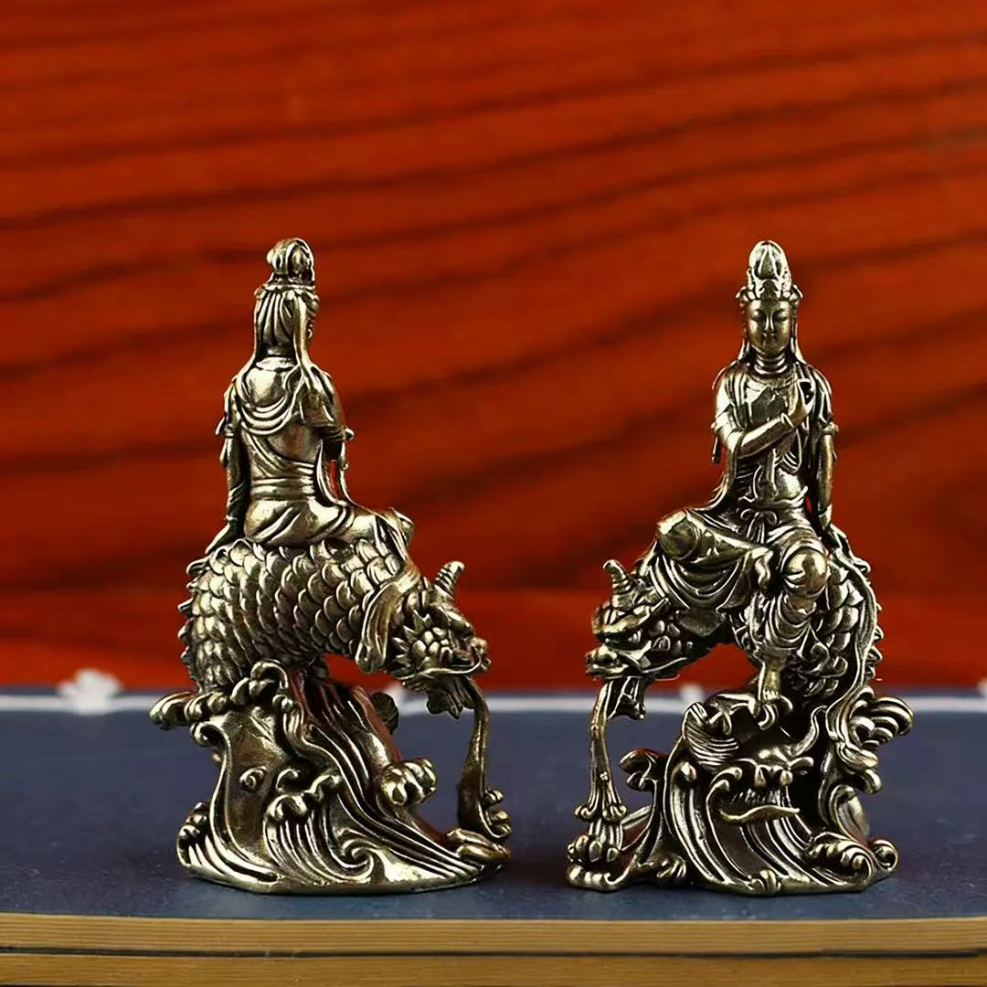 Brass guanyin / Buddha sitting on dragon fish