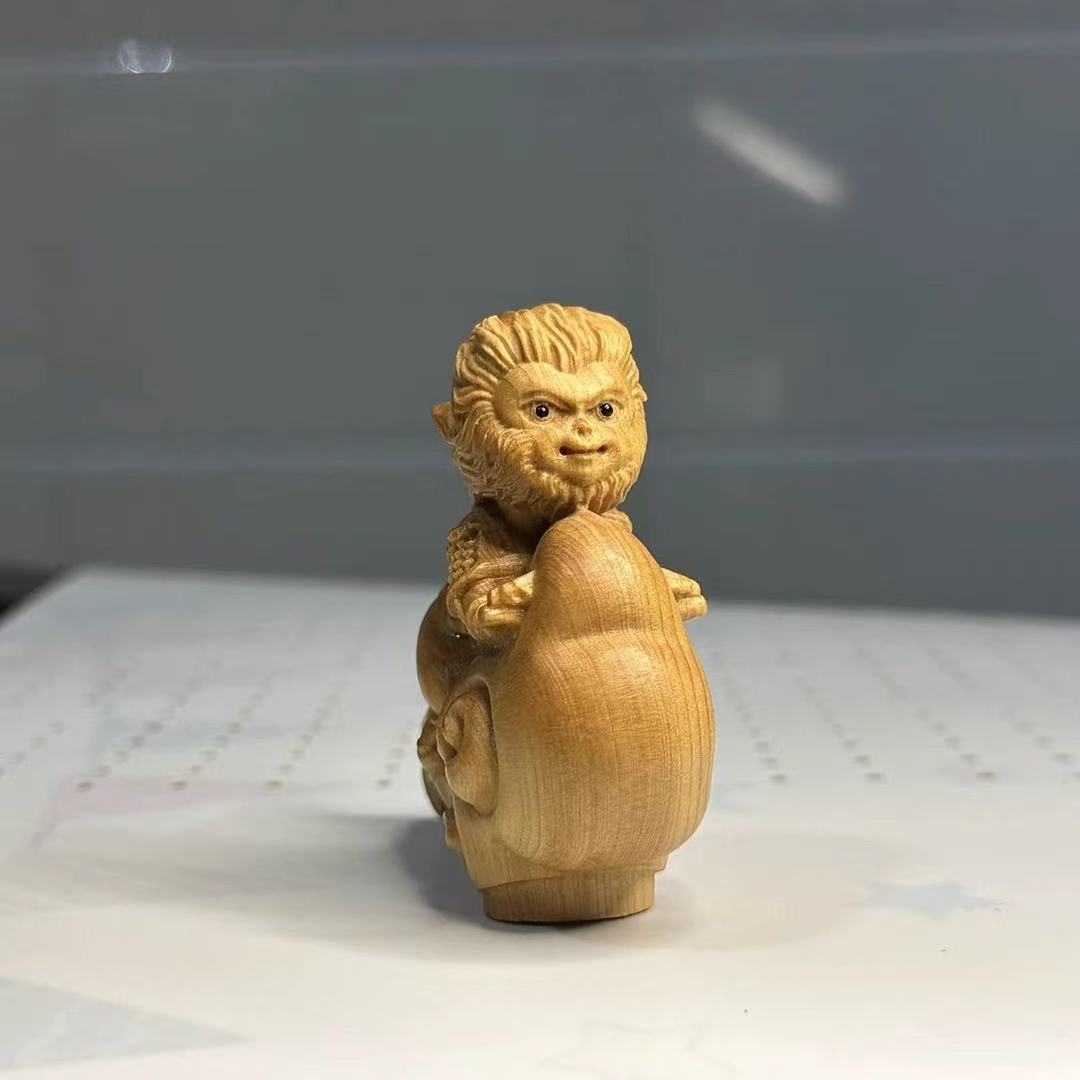 6CM Arborvitae wood monkey king sitting on lucky cloud