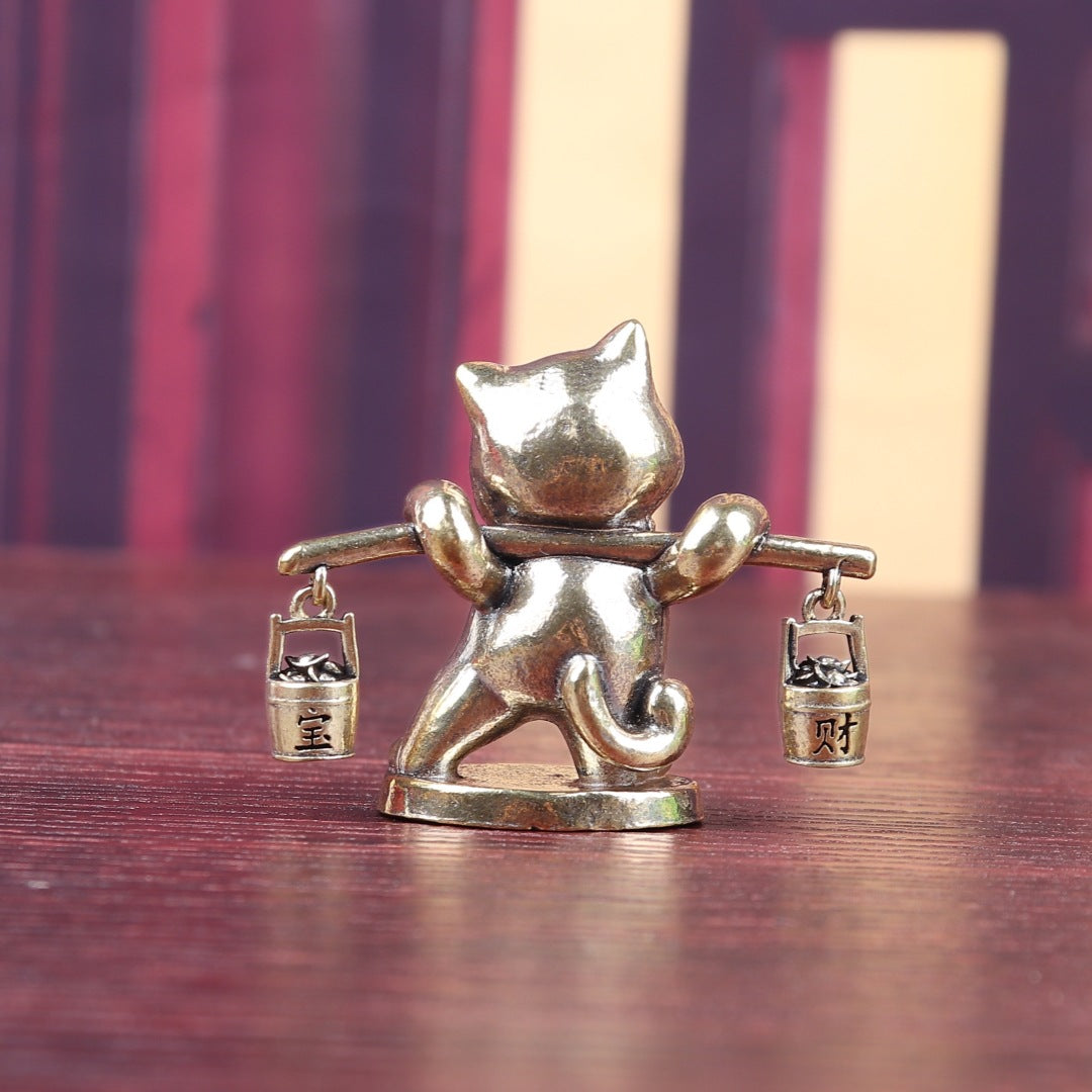 Brass money cat carrying barrels