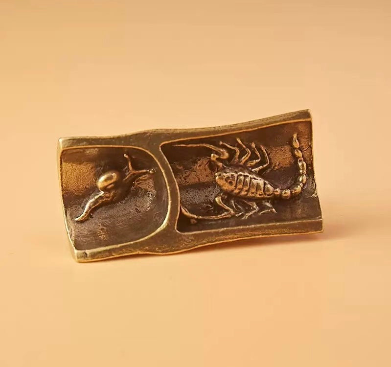 Brass cicada on bamboo