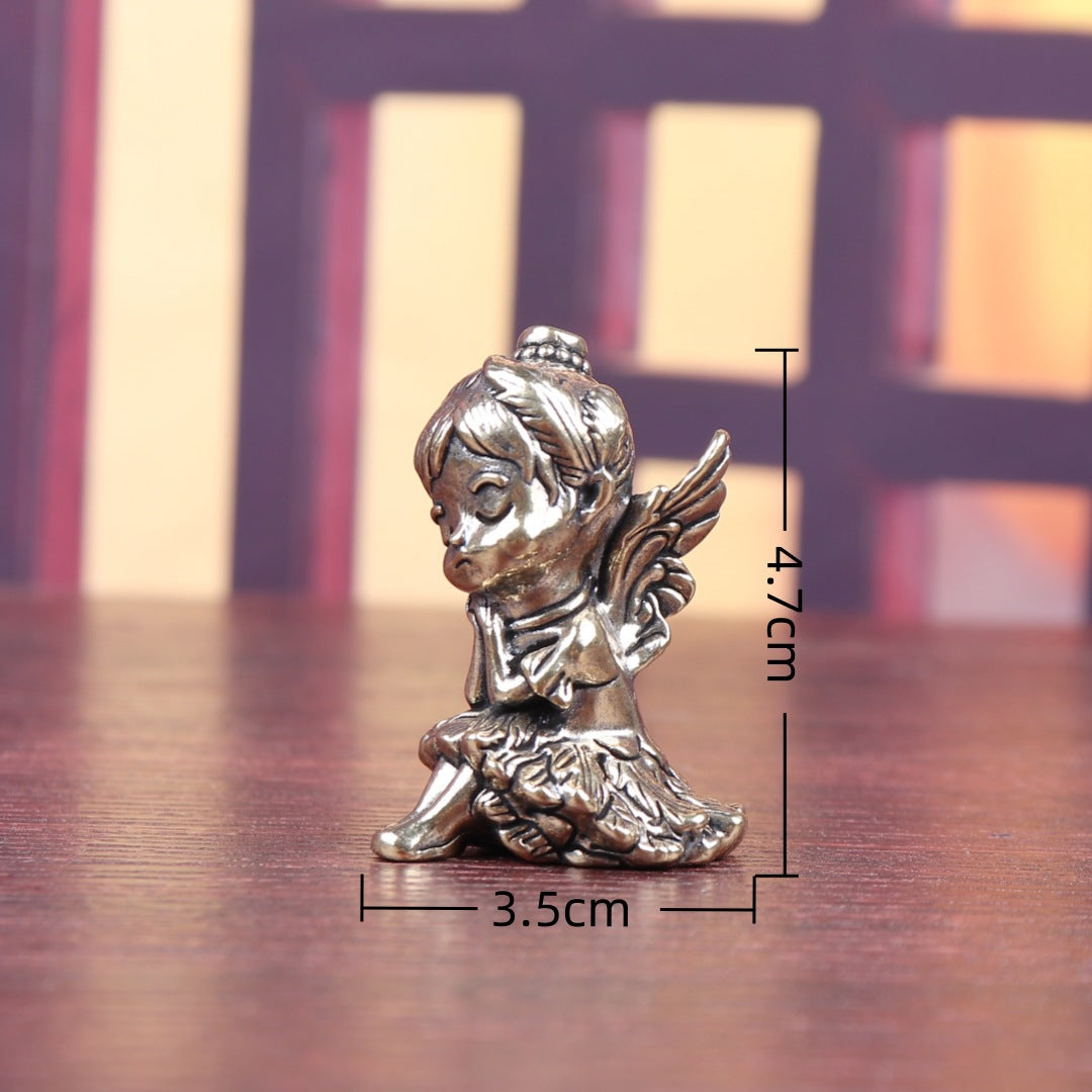 Brass sleeping angel