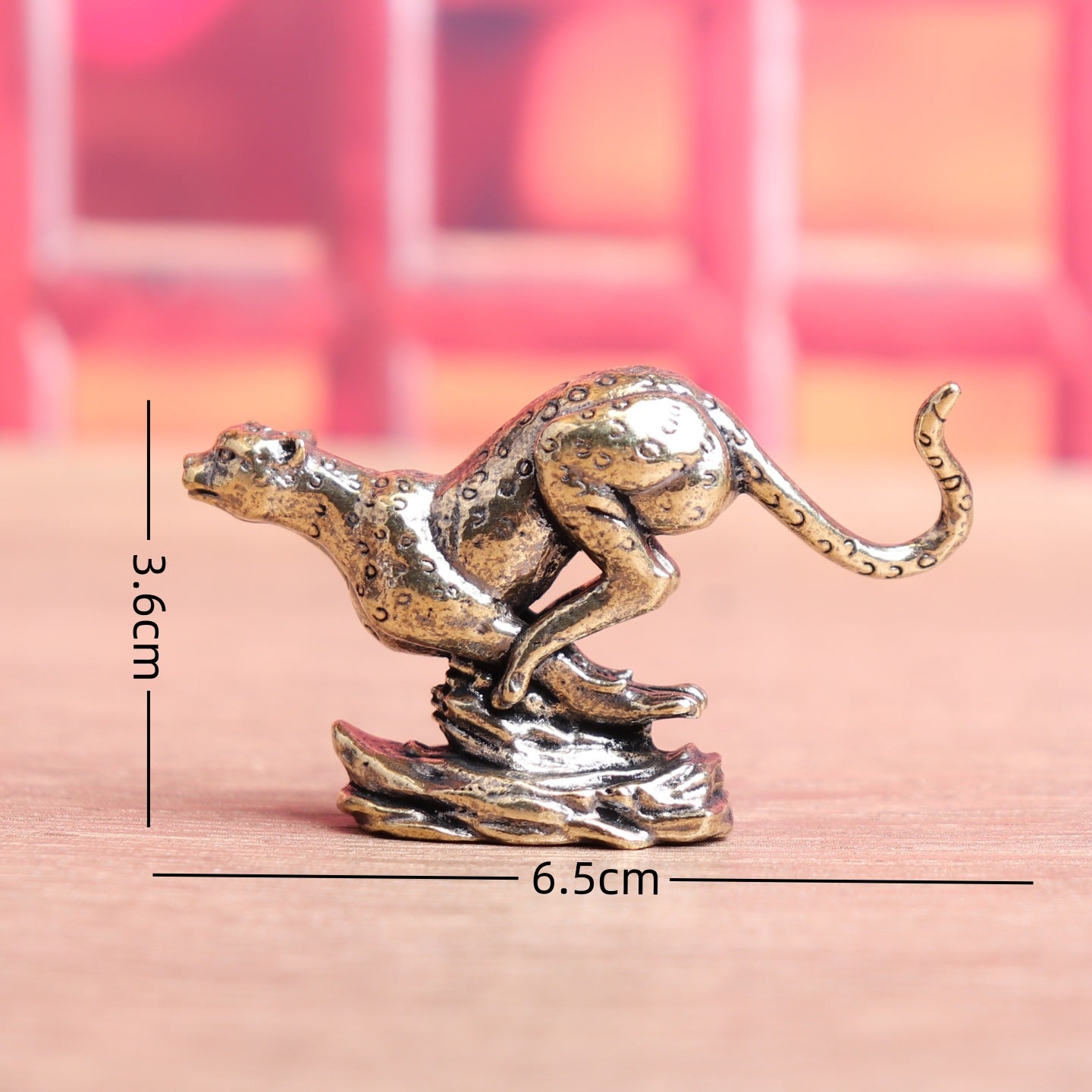 Brass running leopard