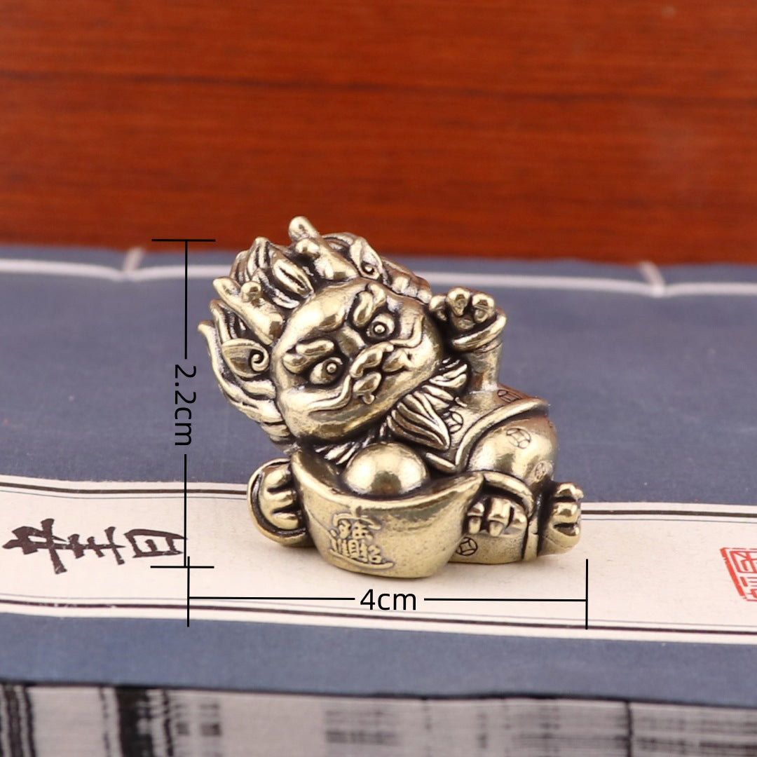 Brass dragon and ingot