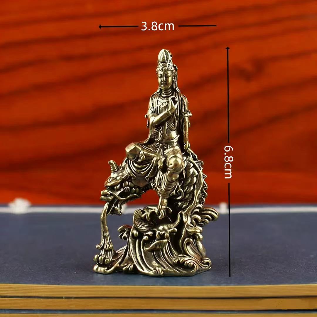 Brass guanyin / Buddha sitting on dragon fish