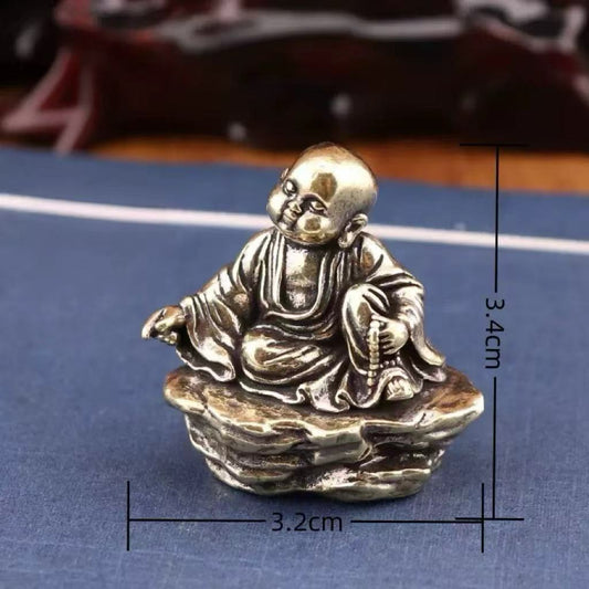 Brass baby monk